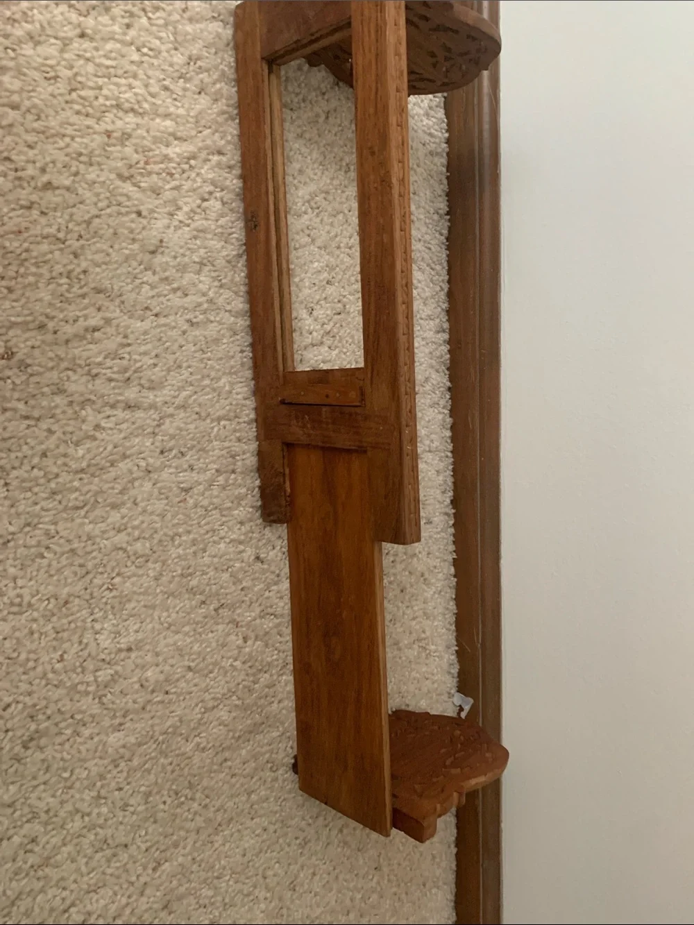 Vintage hand carved expanding book rack.
